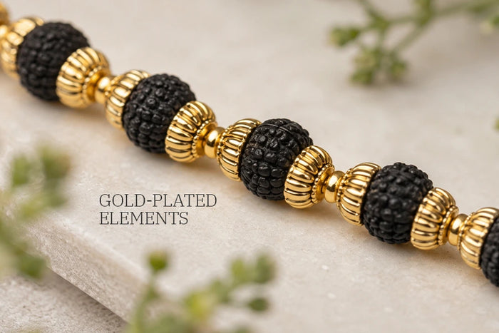 Essential_Rudraksha_Mala_with_Gold_Finishing_Capping