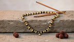 Essential_Rudraksha_Mala_with_Gold_Finishing_Capping