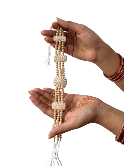 Sister tying Rakhi
